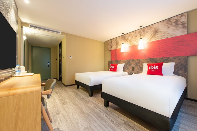 Imagen de la habitación del Hotel Ibis Dalian Xinghai Park. Foto 7