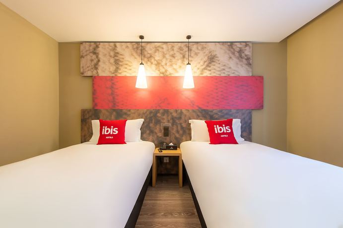 Imagen de la habitación del Hotel Ibis Dalian Xinghai Park. Foto 8