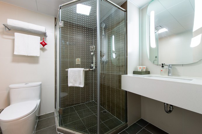 Imagen de la habitación del Hotel Ibis Dalian Xinghai Park. Foto 9