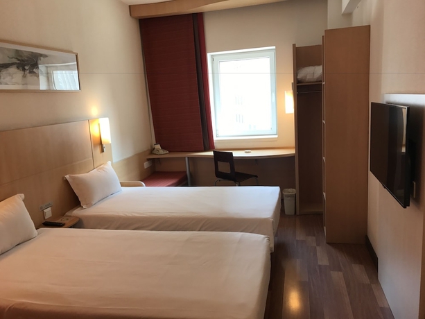 Imagen de la habitación del Hotel Ibis Dalian Zhongshan Square. Foto 5