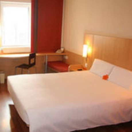 Imagen de la habitación del Hotel Ibis Dalian Zhongshan Square. Foto 7