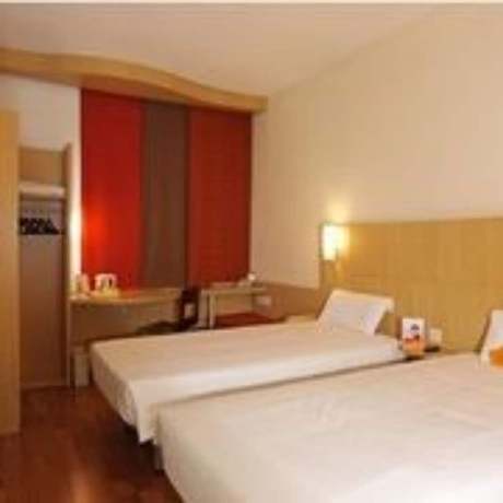 Imagen de la habitación del Hotel Ibis Dalian Zhongshan Square. Foto 8