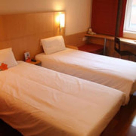 Imagen de la habitación del Hotel Ibis Dalian Zhongshan Square. Foto 10