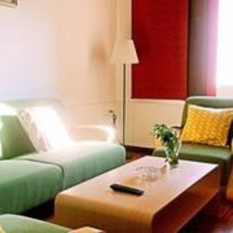 Imagen de la habitación del Hotel Ibis Dalian Zhongshan Square. Foto 17