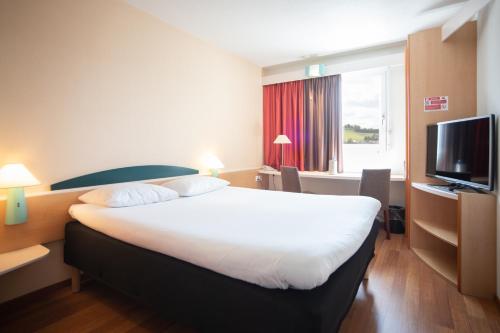 Imagen de la habitación del Hotel Ibis Fribourg. Foto 4