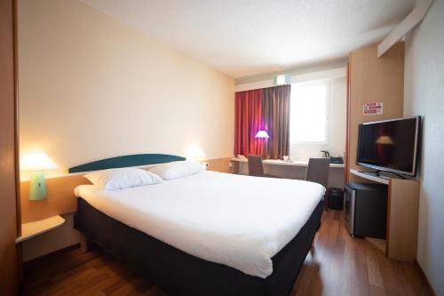 Imagen de la habitación del Hotel Ibis Fribourg. Foto 6