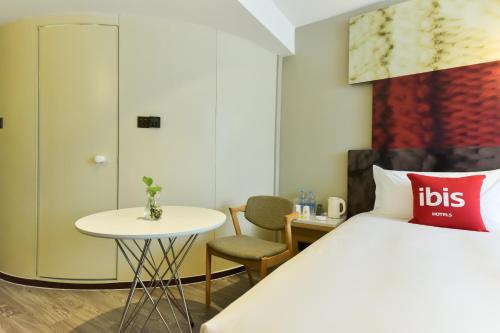 Imagen de la habitación del Hotel Ibis Guangzhou Pazhou International Exhibition Center. Foto 6