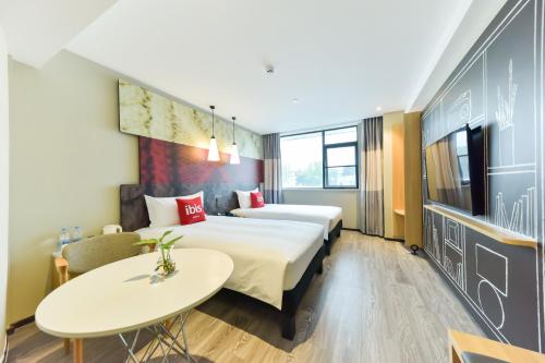 Imagen de la habitación del Hotel Ibis Guangzhou Pazhou International Exhibition Center. Foto 8