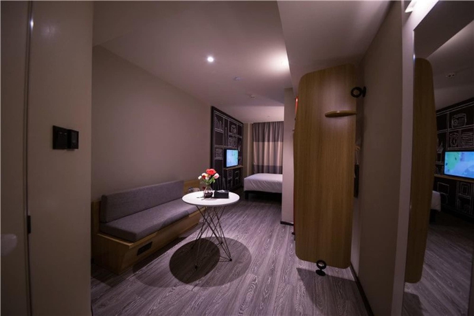 Imagen de la habitación del Hotel Ibis Guangzhou Yuexiu Park. Foto 10