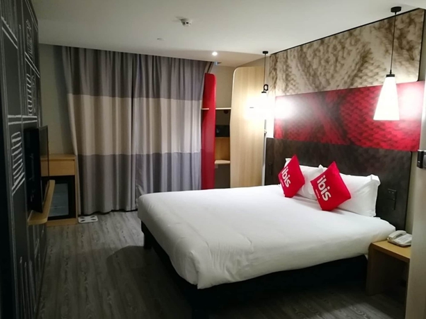 Imagen de la habitación del Hotel Ibis Guangzhou Yuexiu Park. Foto 11