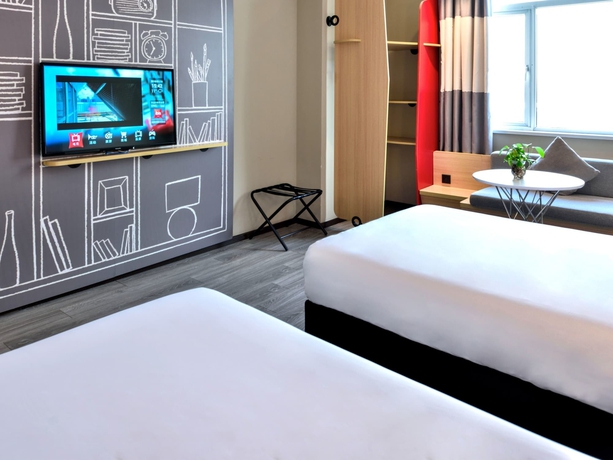 Imagen de la habitación del Hotel Ibis Guangzhou Yuexiu Park. Foto 12