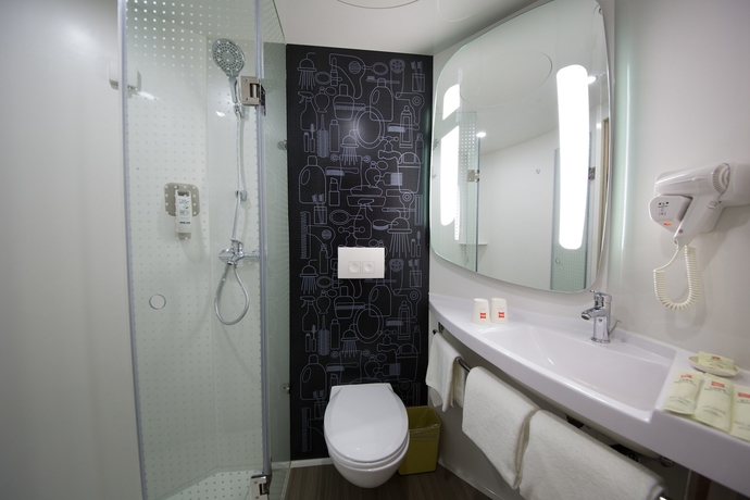 Imagen de la habitación del Hotel Ibis Guangzhou Yuexiu Park. Foto 13