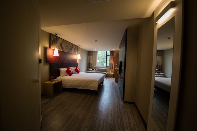 Imagen de la habitación del Hotel Ibis Guangzhou Yuexiu Park. Foto 17