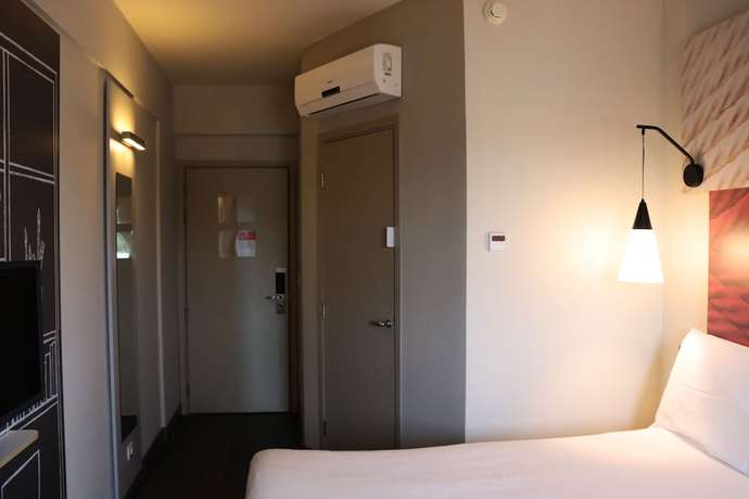 Imagen de la habitación del Hotel Ibis Guaxupe. Foto 11