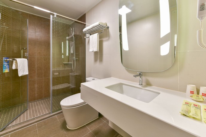 Imagen de la habitación del Hotel Ibis Guilin Railway Station. Foto 6