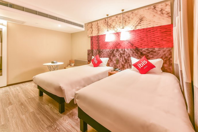 Imagen de la habitación del Hotel Ibis Guilin Railway Station. Foto 8