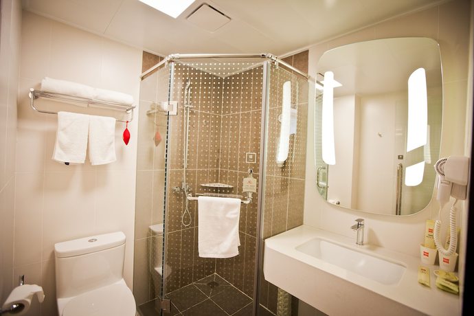 Imagen de la habitación del Hotel Ibis Harbin Hongqi Street. Foto 11