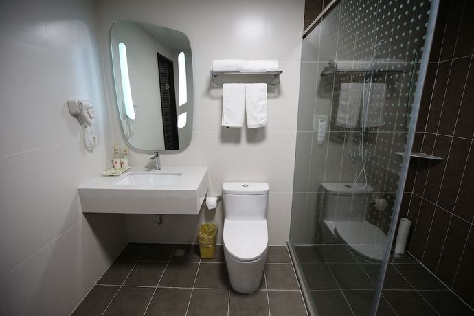 Imagen de la habitación del Hotel Ibis Harbin Museum. Foto 11