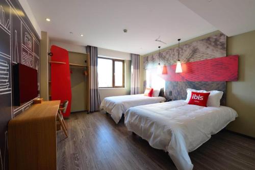 Imagen de la habitación del Hotel Ibis Harbin Normal University. Foto 4