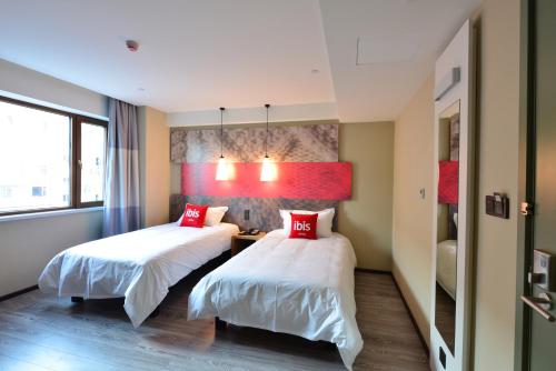 Imagen de la habitación del Hotel Ibis Harbin Normal University. Foto 5