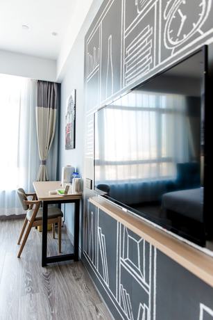 Imagen de la habitación del Hotel Ibis Harbin Songbei Wanda City. Foto 17