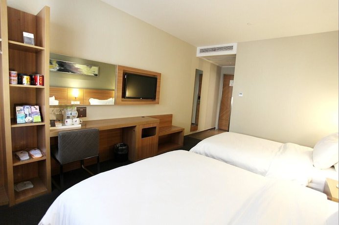 Imagen de la habitación del Hotel Ibis Hotel Yangzhou Wenchangge. Foto 4
