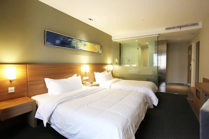 Imagen de los interiores del Hotel Ibis Hotel Yangzhou Wenchangge. Foto 18