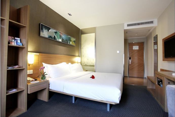 Imagen de la habitación del Hotel Ibis Hotel Yangzhou Wenchangge. Foto 13