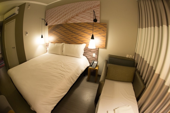 Imagen de la habitación del Hotel Ibis Jacarei. Foto 10