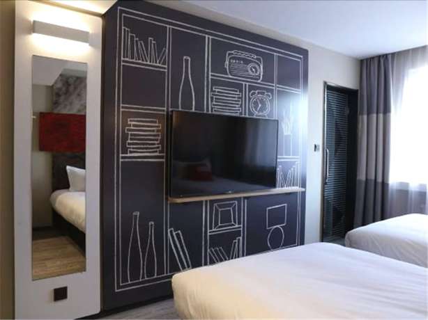 Imagen de la habitación del Hotel Ibis Jilin Beishan Park. Foto 7