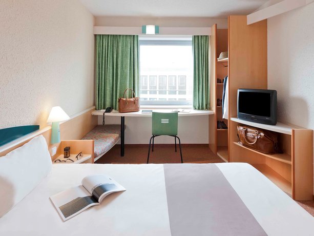 Imagen de la habitación del Hotel Ibis Köln Messe. Foto 16