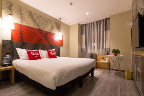 Imagen de la habitación del Hotel Ibis Lanzhou Wuquan Square. Foto 6