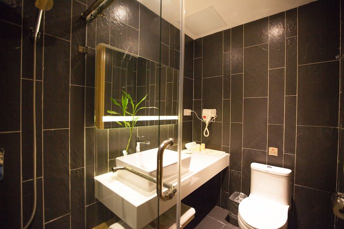 Imagen de la habitación del Hotel Ibis Leshan City Center. Foto 10