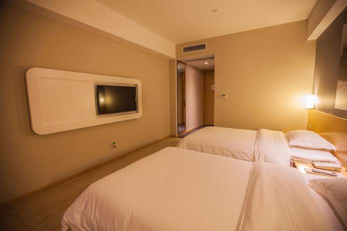 Imagen de la habitación del Hotel Ibis Leshan City Center. Foto 12