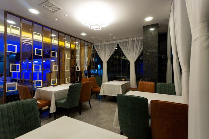 Imagen de la habitación del Hotel Ibis Luoyang Train Station. Foto 11