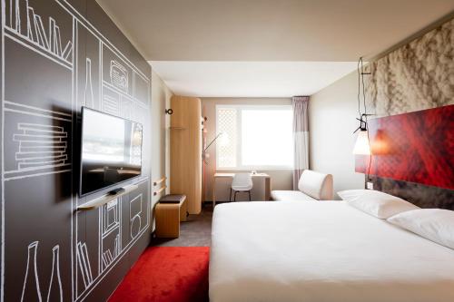 Imagen de la habitación del Hotel Ibis Lyon Carre De Soie. Foto 7