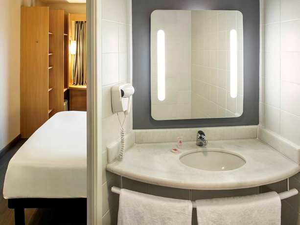 Imagen de la habitación del Hotel Ibis Macae. Foto 11