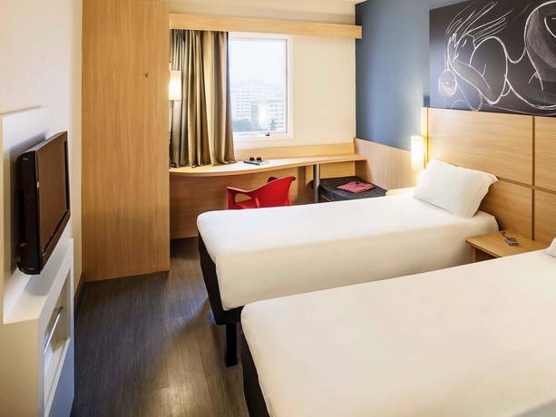 Imagen de la habitación del Hotel Ibis Macae. Foto 13