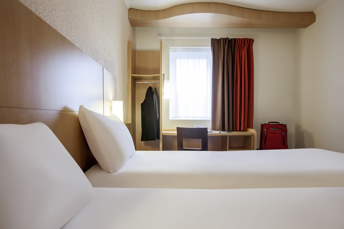 Imagen de la habitación del Hotel Ibis Maine Montparnasse. Foto 8