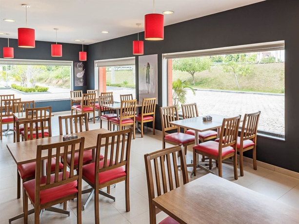 Imagen del bar/restaurante del Hotel Ibis Manaus Distrito Industrial. Foto 4