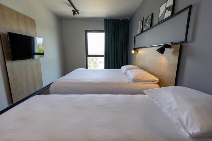 Imagen de la habitación del Hotel Ibis Marseille Marignane Technopole. Foto 4