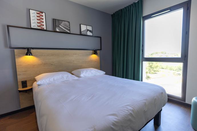 Imagen de la habitación del Hotel Ibis Marseille Marignane Technopole. Foto 7