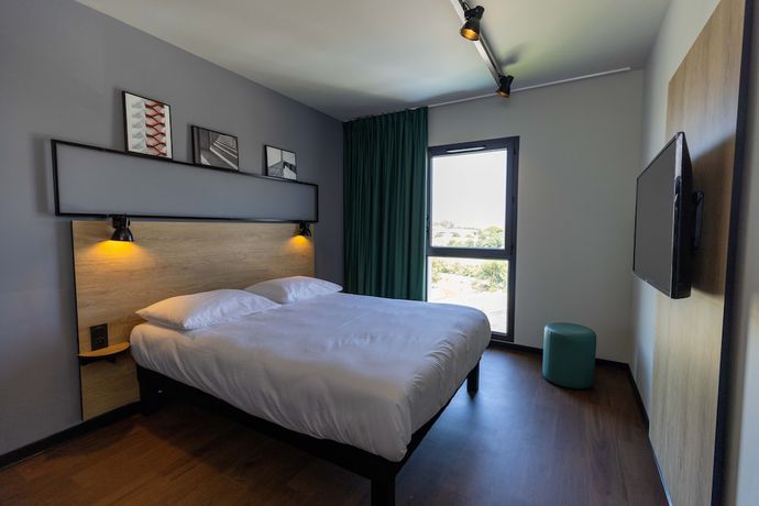 Imagen de la habitación del Hotel Ibis Marseille Marignane Technopole. Foto 19