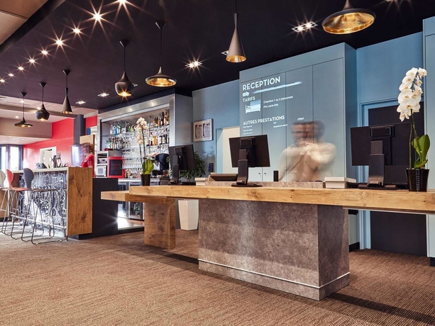 Imagen del bar/restaurante del Hotel Ibis Marseille Provence Aéroport. Foto 2