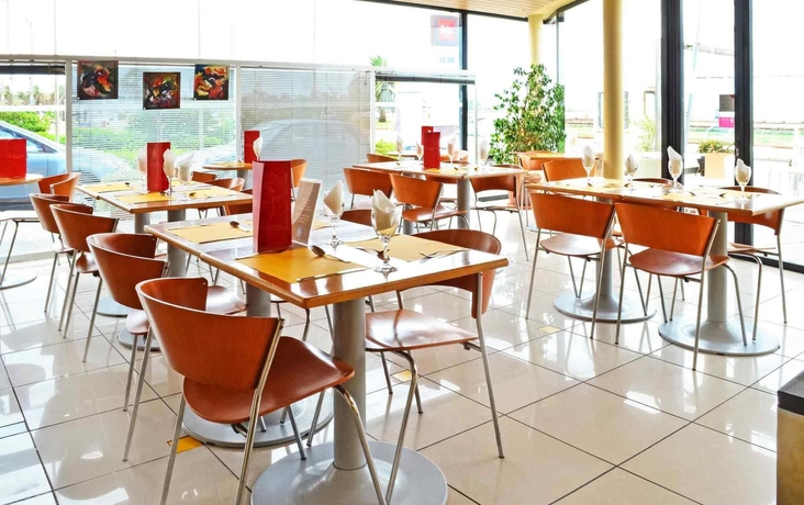 Imagen del bar/restaurante del Hotel Ibis Montevideo Rambla. Foto 5