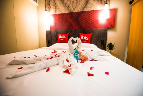 Imagen de la habitación del Hotel Ibis Nanjing Jiangjun Avenue. Foto 8