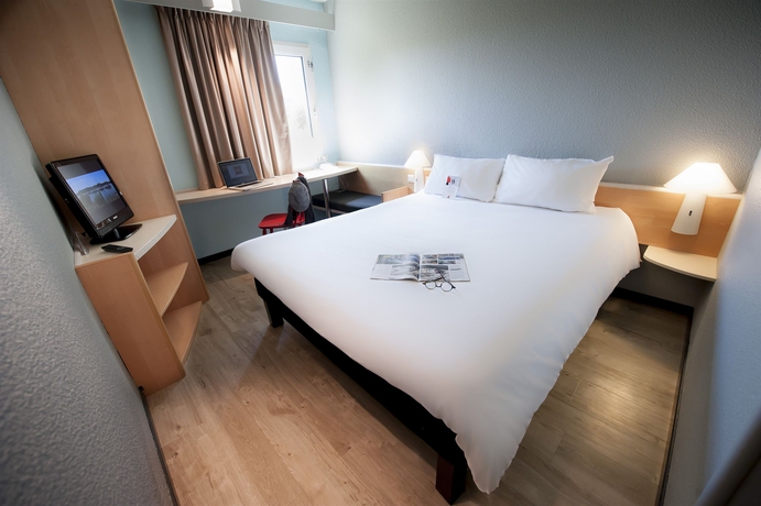Imagen de la habitación del Hotel Ibis Nantes La Beaujoire Parc Expo. Foto 11