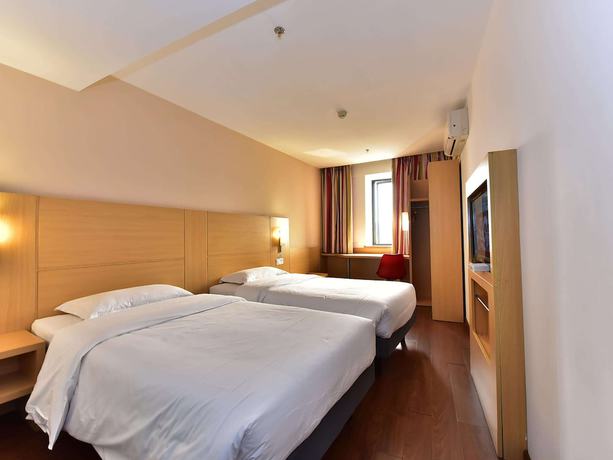 Imagen de la habitación del Hotel Ibis Ningbo Tianyi Square. Foto 13