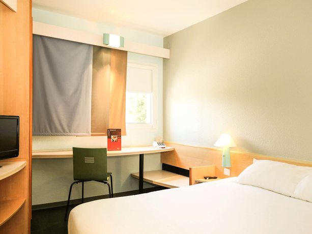 Imagen de la habitación del Hotel Ibis Orange Centre Échangeur A7 A9. Foto 1