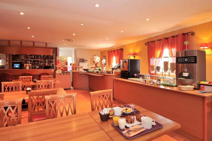 Imagen del bar/restaurante del Hotel Ibis Orange Sud. Foto 7